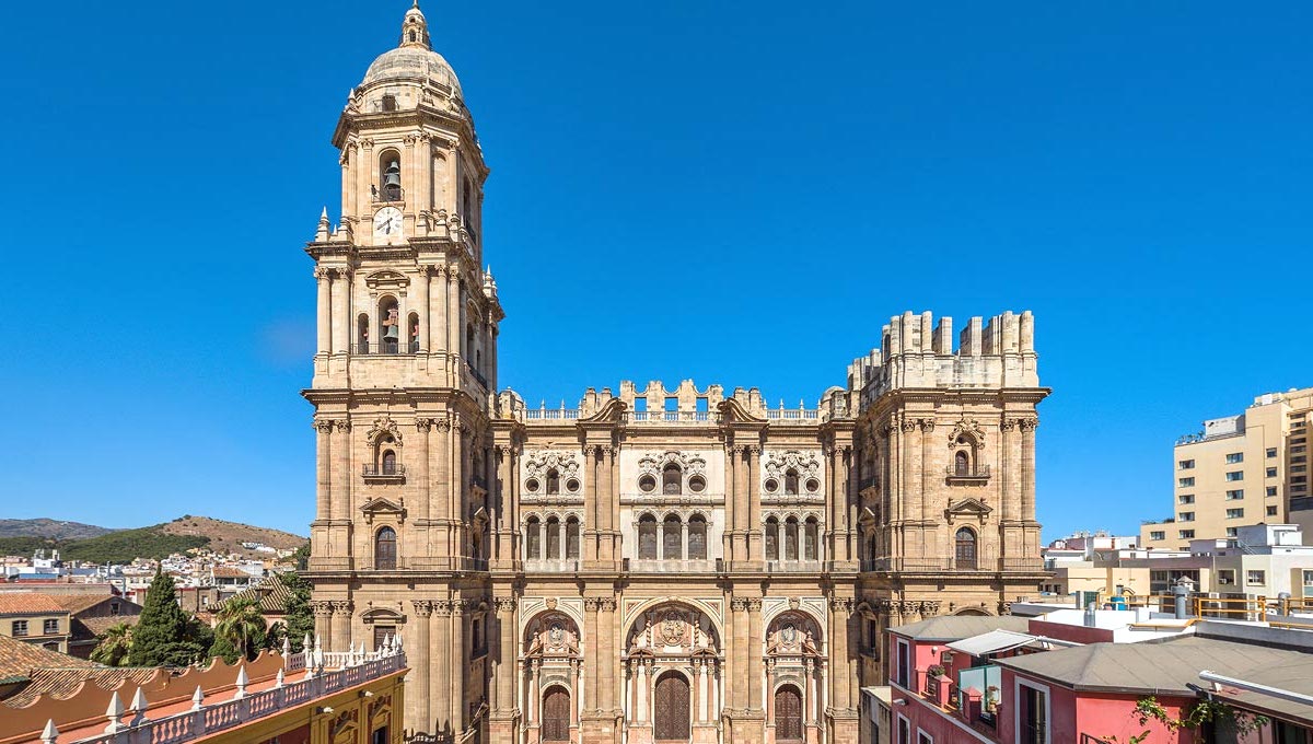 View of Malaga Cathedral's unfinished second tower, a symbol of intrigue and historical complexity.
