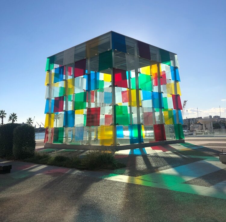 Exterior view of Centre Pompidou Malaga with its iconic colorful cube structure.