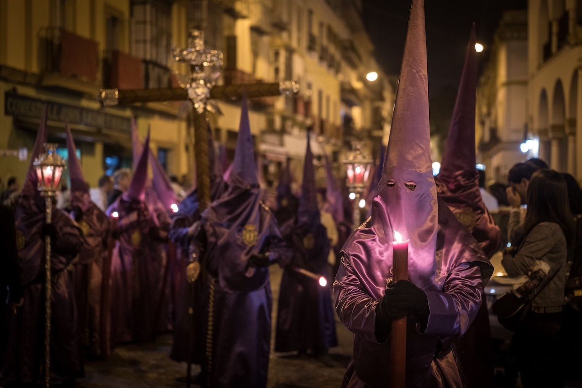 Semana Santa Night Procession with Candles and Traditional Attire